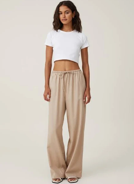 White T-Shirt + Linen Pants + Slides